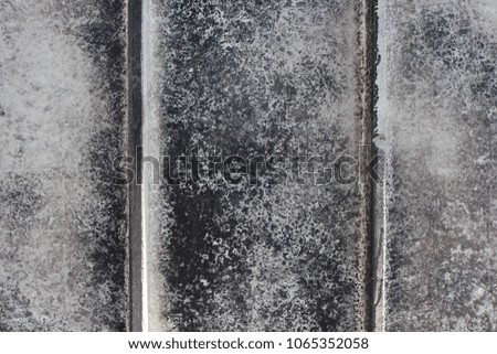 Grunge concrete wall   texture. Cement grungy grey textured with dark spot. Retro background