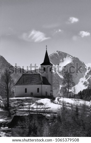 Little church in the mountains of the Slovenian alps on a beautiful day