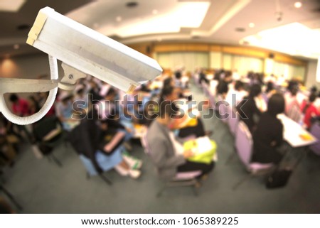 CCTV camera system security in Blurred background business Meeting Conference Training Learning Coaching Concept.