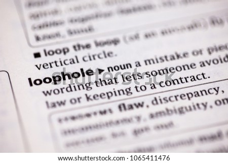 Close up to the dictionary definition of Loophole Royalty-Free Stock Photo #1065411476