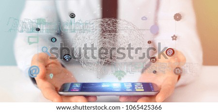 View of a Businessman holding a 3d rendering artificial intelligence concept with a brain and app