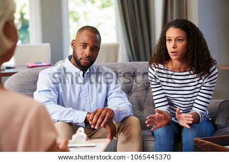 Young couple having marriage counselling Royalty-Free Stock Photo #1065445370