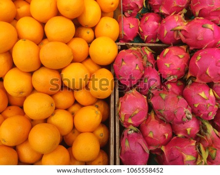 Half of Oranges and half of dragon fruit