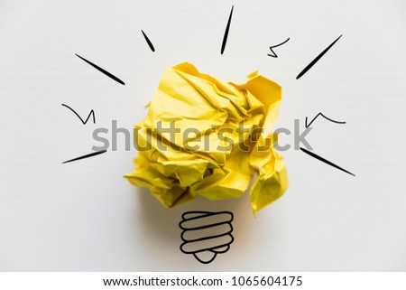 Creative idea. Concept of idea and innovation with yellow paper ball and light bulb