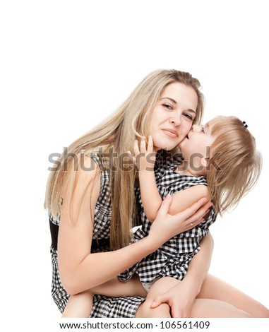 little daughter kiss happy mother hugging smile looking at the camera isolated over white background, concept of togetherness family love 2 year cute girl child embrace