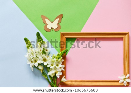 Close up photo for Happy Mother's Day, Women's Day, Valentine's Day or Birthday on the Pastel Candy Colours Background. Floral flat lay minimalism geometric patterns greeting card.