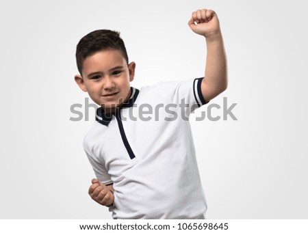 little boy dancing and happy