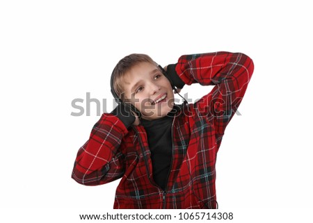 Teen listening to music with headphones on white background
