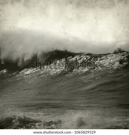 textured old paper background with poweful ocean waves