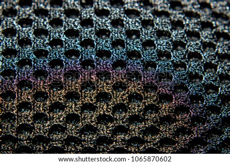 
mesh fabric in black with rainbow colors
