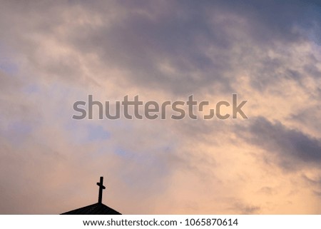 
Christian cross on a dramatic sky