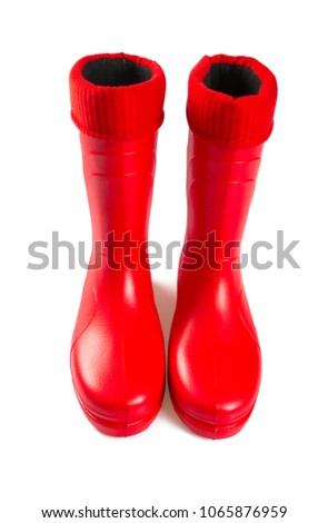 red rubber boots isolated on white