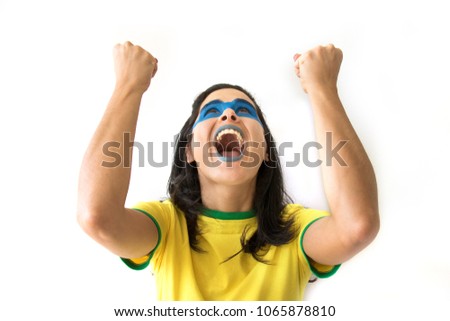 Soccer woman celebrating on yellow uniform isolated on white background. Beautiful woman happy and cheering.
