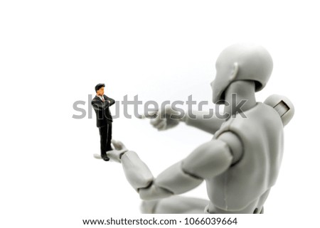 Model robot with miniature people businessman,Business and technology.