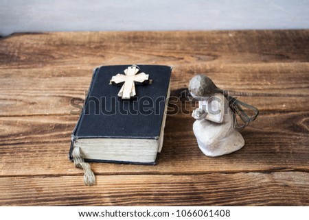 angel old bible and cross