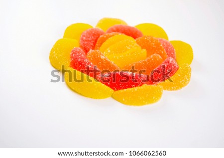 dukorating with colorful marmalade on a light background