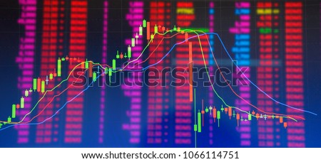 Double exposure Technical candlestick price chart showing up and down trend, volatility, panic sell, red selling stock ticker trading data on computer screen background  Financial business concept Royalty-Free Stock Photo #1066114751