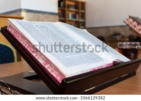 background of Book of Talmud on Stand. Gemara in Hebrew Royalty-Free Stock Photo #1066129382