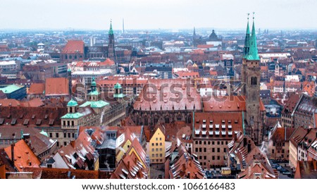 Panoramic Cityscape of Nuremberg with snow covered roofs, Germany