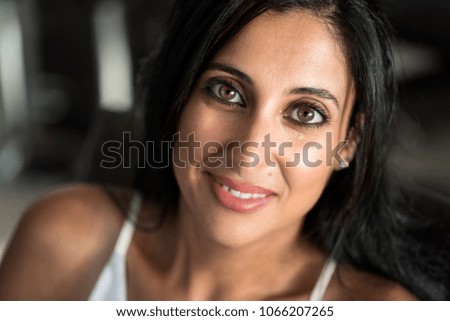 Portrait of an attractive woman.
Closeup portrait of a smiling brunette woman.
 Royalty-Free Stock Photo #1066207265