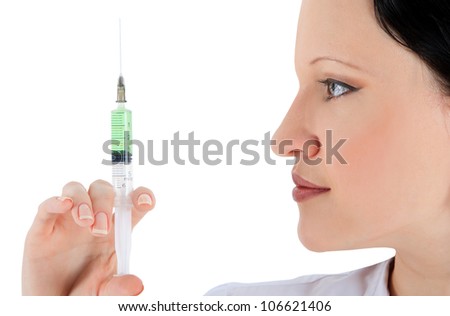 Close-up of a woman doctor with syringe