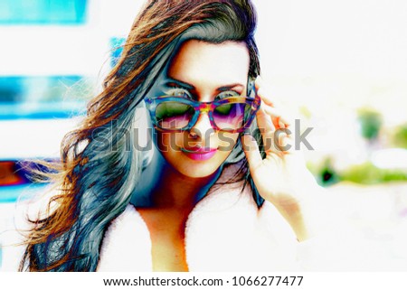 Beautiful young woman fashion portrait wearing sunglasses in a modern digital infrared style reproduction.