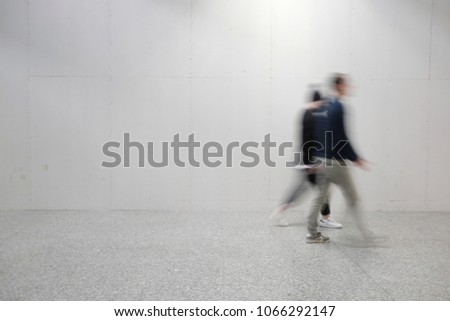 blurred people at the airport