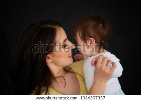 The happinest mother embracing her daughter