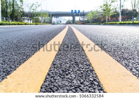 empty asphalt road with modern building