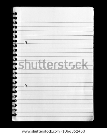 Open notepad with lined paper on black background