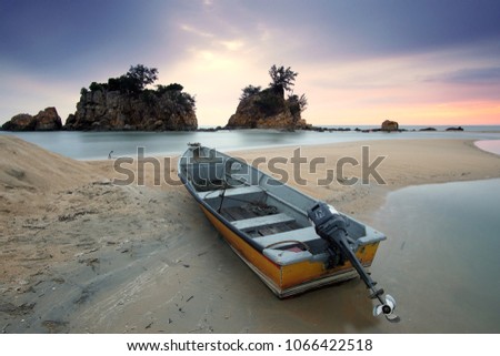 Picture of small fisherman boat at beach