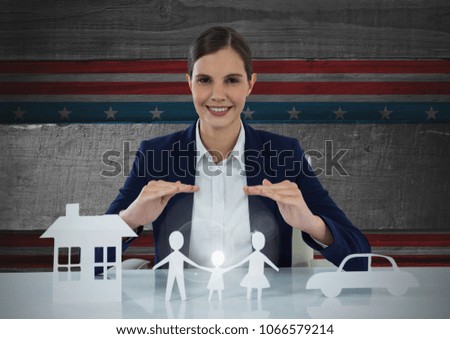 Business woman with house, family and car on paper