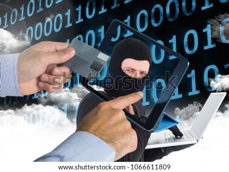 Man using a tablet with hacker head on screen while holding a credit card