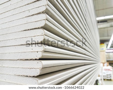 The stack of gypsum board preparing for construction Royalty-Free Stock Photo #1066624022