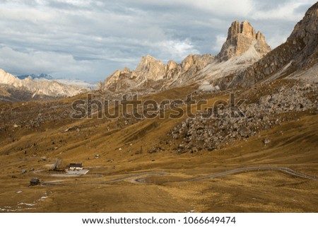 Alpine Mountains Dolomites - panoramic view from Passo Giau, Cortina d'Ampezzo, Italy in autumn morning colors
