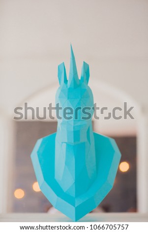 unicorn head paper on wall mirror light interior studio