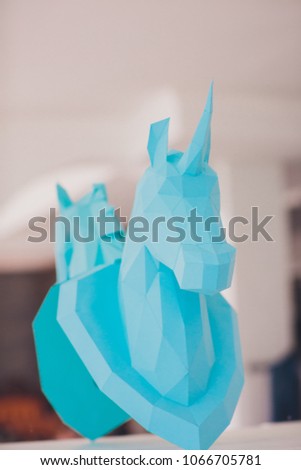 unicorn head paper on wall mirror light interior studio