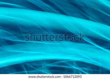 Abstract background of blue neon glowing light shapes. Bright stripes  Can use for poster, website, brochure, print.