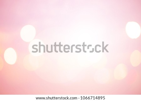 abstract blurred beautiful pastel pink and blush color glamour background with bokeh glow light for banner web design or slide show concept