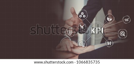 Key Performance Indicator (KPI) using Business Background with infographic versus planned target, person touching screen icon, success concept.