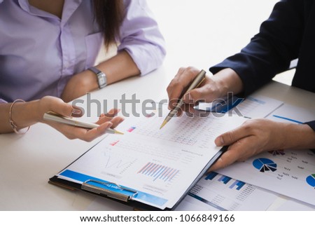Business people meeting to analyze and discuss the situation on the financial report in meeting room. Meeting planning budget and cost. Business financial analysis and strategy concept. Royalty-Free Stock Photo #1066849166