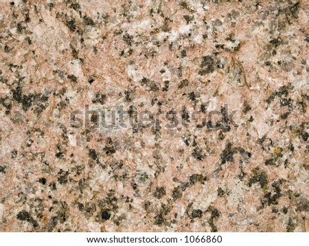 Stock macro photo of the texture of pink granite.  Useful for layer masks and abstract backgrounds.