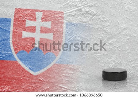 An image of the Slovak flag and on ice and a hockey puck. Concept, hockey