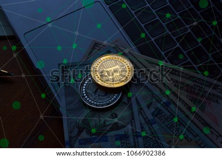 Bitcoin Cryptocurrency Carrency Blockchain  Wallet digital Concept. Gold and silver  coin is located on dollar and computer. 