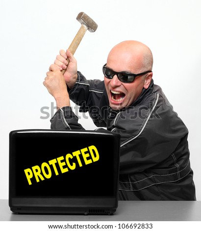 Frustrated hacker and protected laptop.