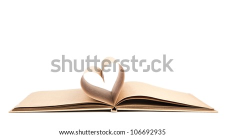 Book with opened pages of shape of heart isolated on white background