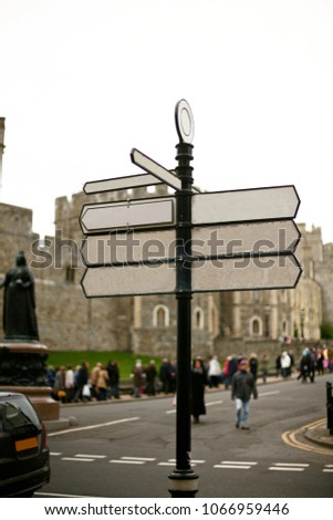 Vintage directional sign in london for guide tourist the attractions location.