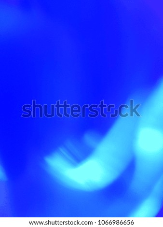 Abstract out of focus lights coming from the mother nature with abstract smooth curves and lines in background. Abstract background of Blue and White color. 