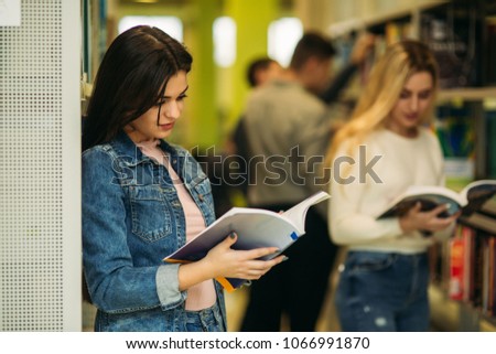 Group of student want to find some helpful literature to preparing for university exam