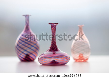 Murano Glass souvenirs, three small vases Royalty-Free Stock Photo #1066996265